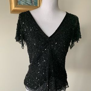 Perfect holiday Black all beaded top with flutter sleeves